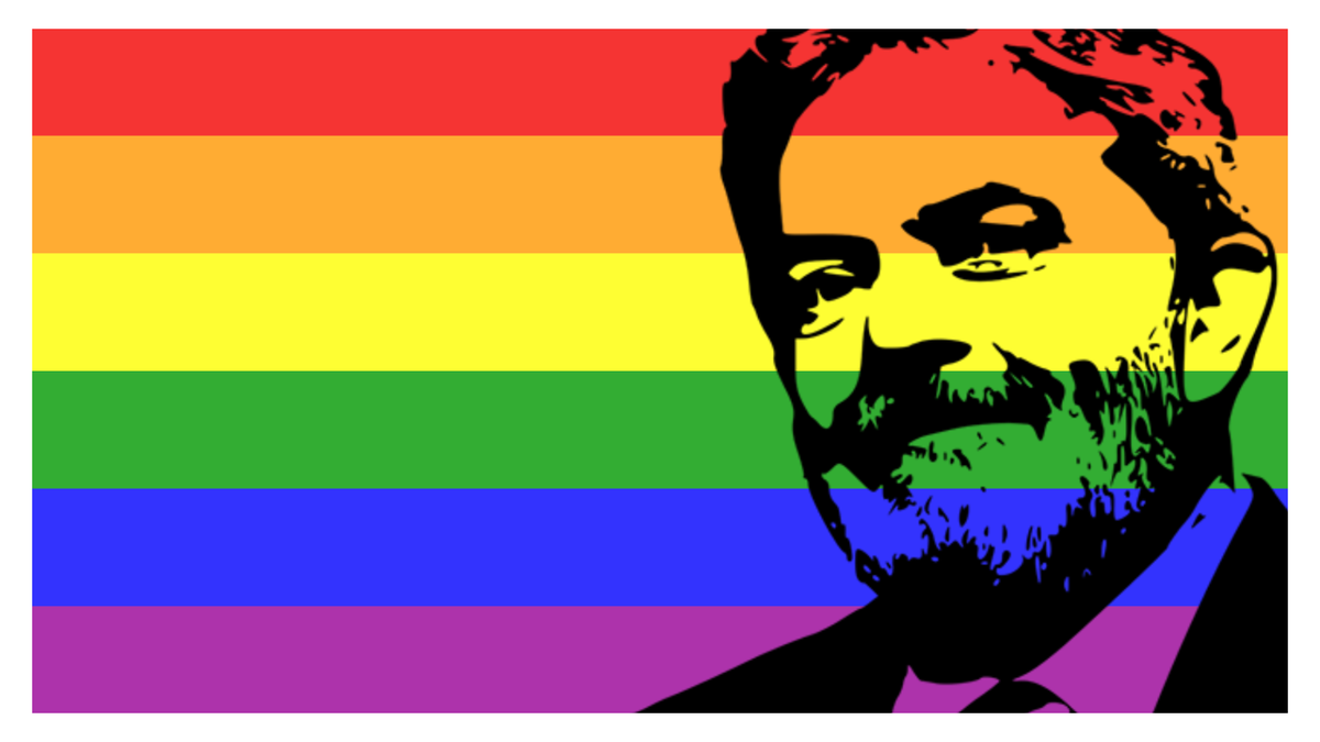 The image shows President Lula's face with a background featuring the colors of the LGBT+ flag.