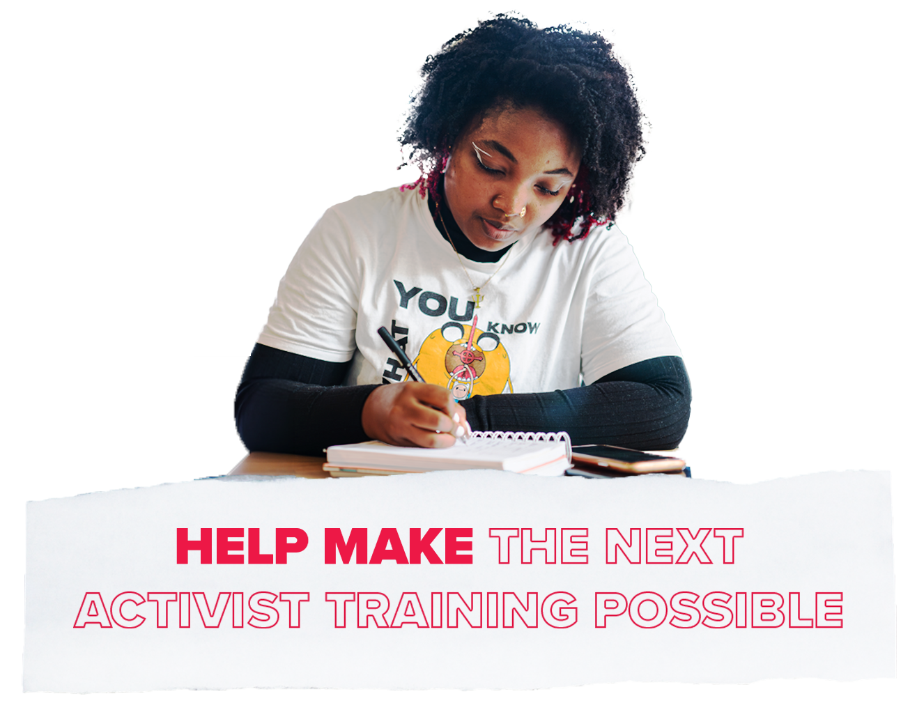 A person wearing a white T-shirt is writing in a notebook at a table. Text below reads, "Help make the next activist training possible."